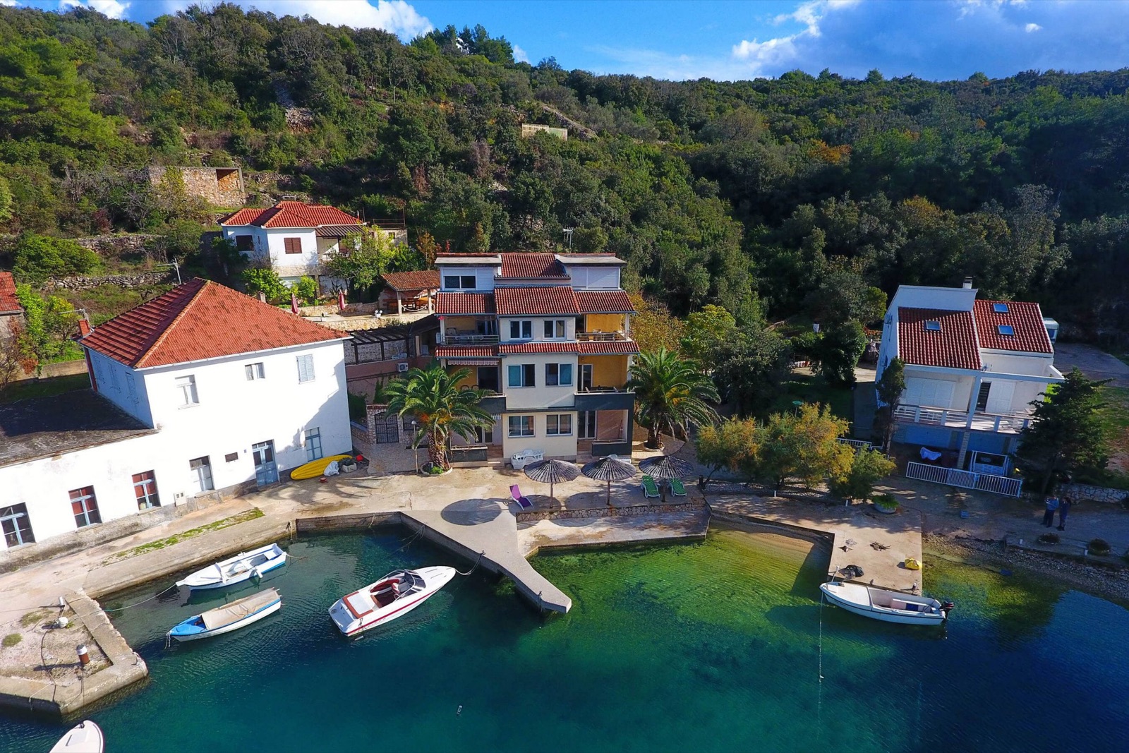 Aerial view of the cove with the jetty and terrace