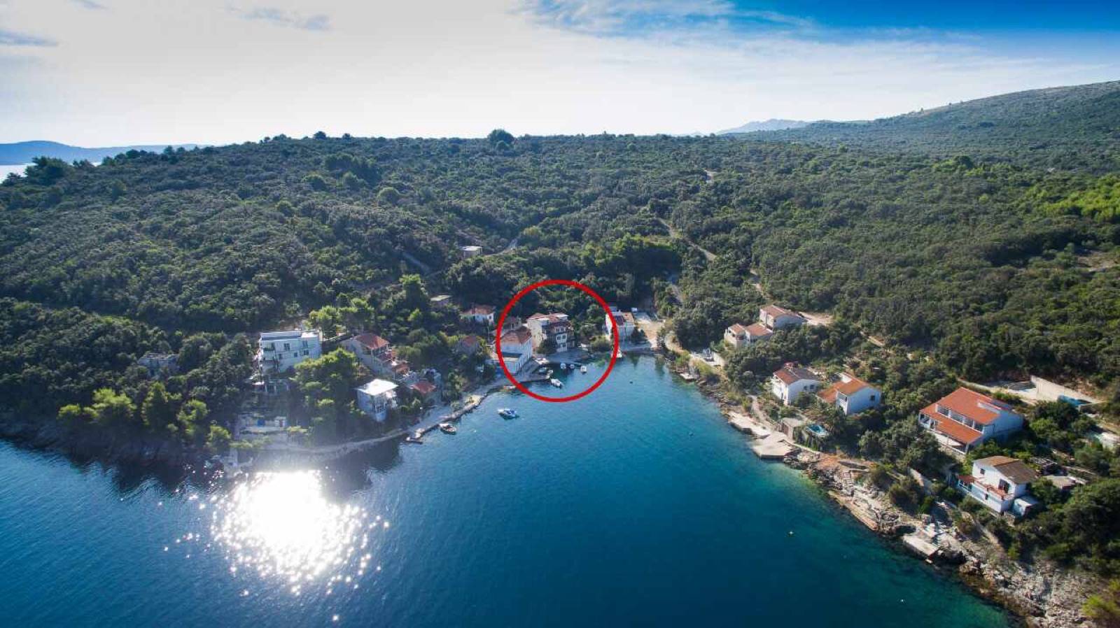 Aerial view with Apartments Iva marked among the neighboring houses